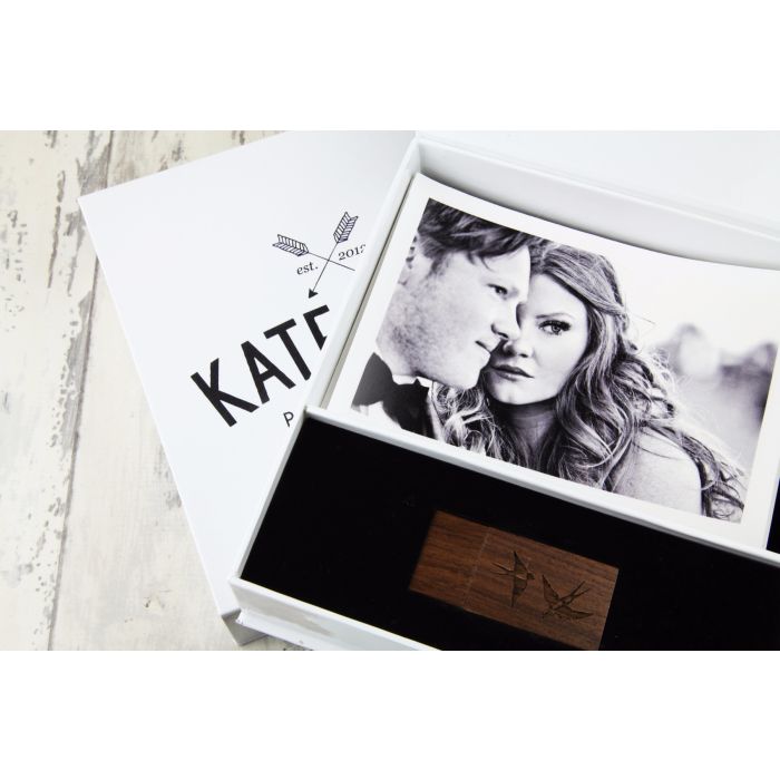 White flip top USB box with photographs