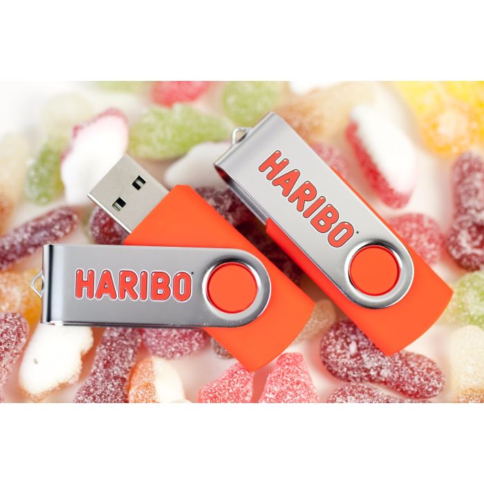 Red branded USB stick with Haribo logo