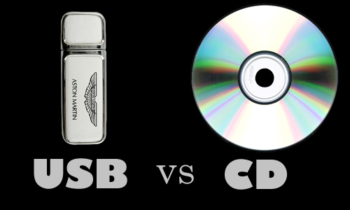 Promotional USB stick next to a CD