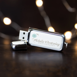 White leather Rodeo USB with lights in background