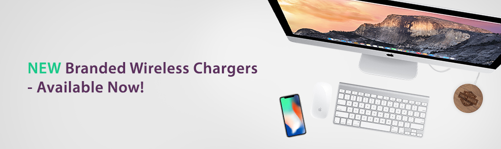 Mac with wooden wireless charger and the text that says NEW Branded Wireless Chargers - Available Now!