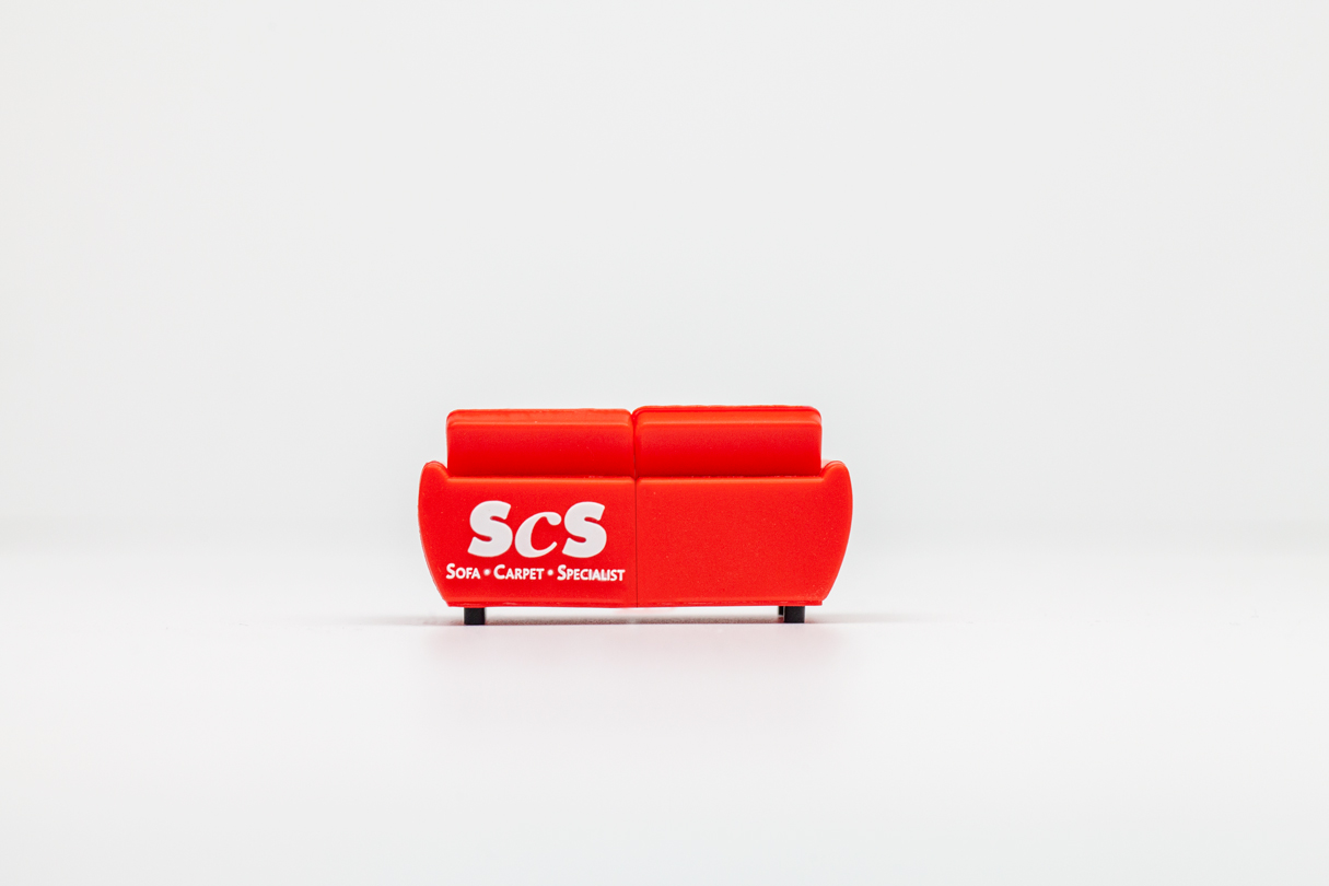 Red sofa shaped custom USB stick with SCS logo