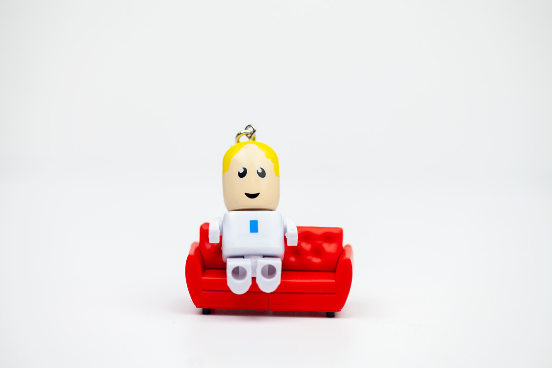 USB people sitting on a custom sofa shaped USB stick