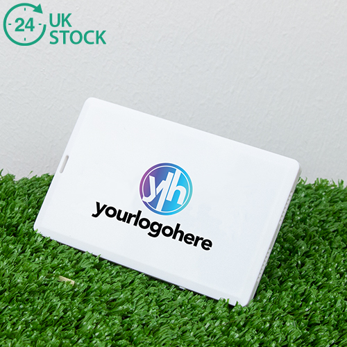 Credit card sized printed speaker with 'your logo here' branded on. Sitting on a grass background with an icon that says 24 hours UK stock.